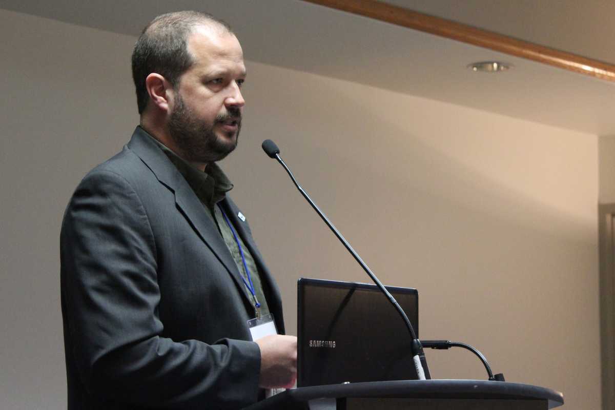 Presenter speaking at the Community-based Water Monitoring Roundtable